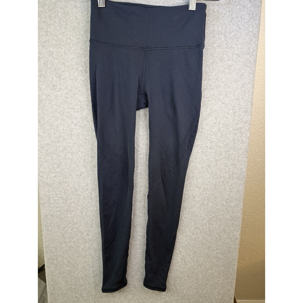 Lululemon black high rise seamless yoga leggings with laser cut out details